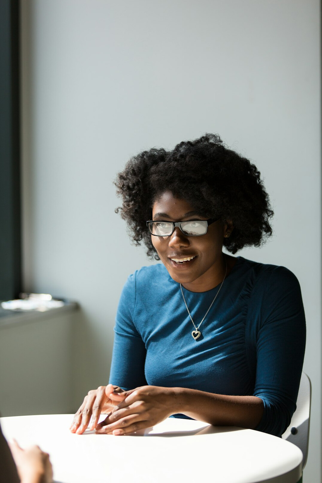 woman speaking confidently at meeting